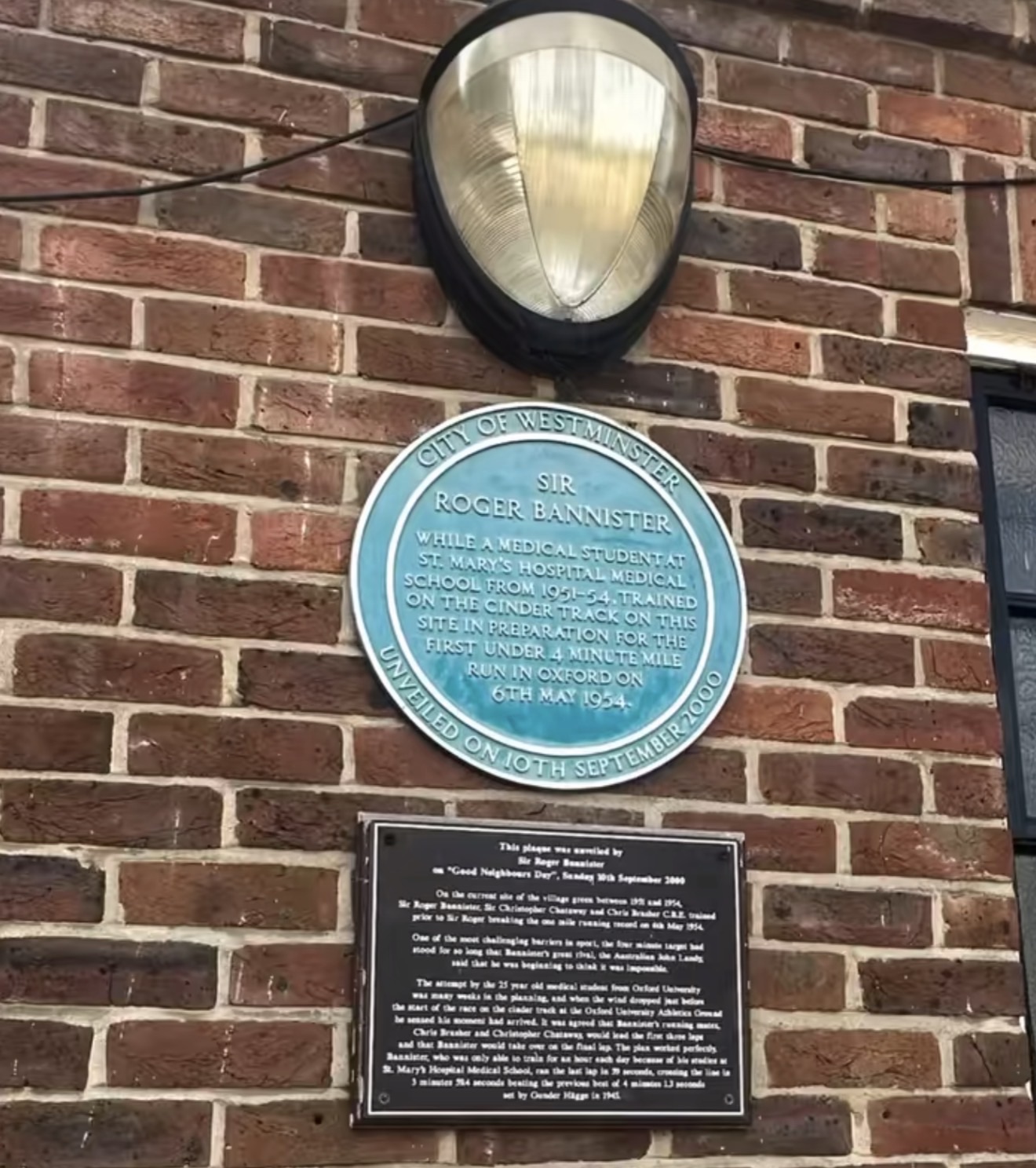 Gate 4 Essendine sign showing Paddington Recreation Ground opening times