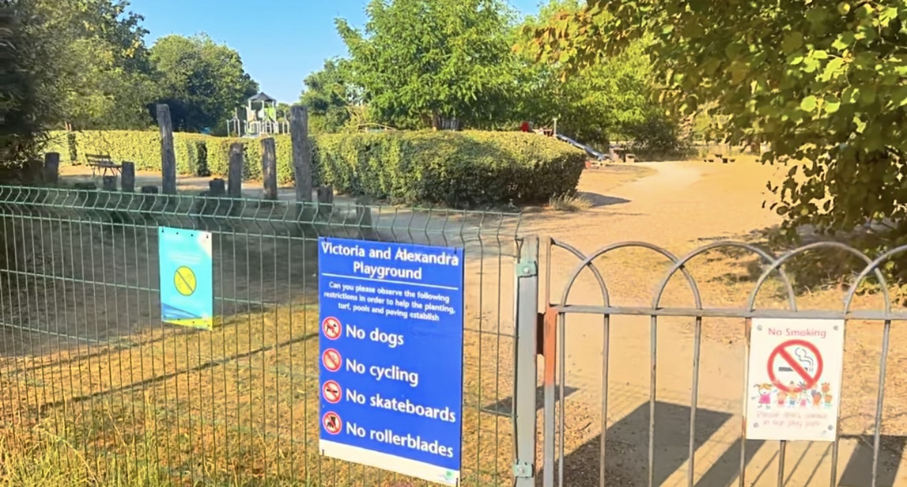 Victoria and Alexandra Playground sign listing rules at the entrance gate