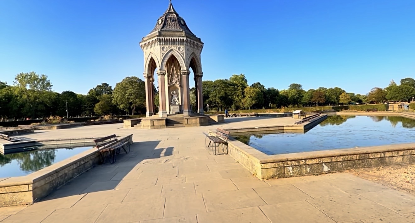 The Burdett-Coutts Memorial Drinking Fountain reflected in its ornamental pools