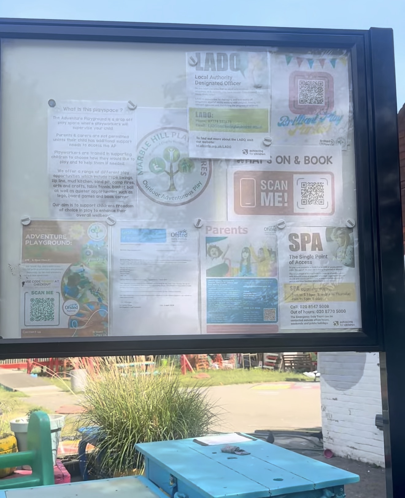 Noticeboard explaining the adventure playground's drop-off supervised play and the activities on offer