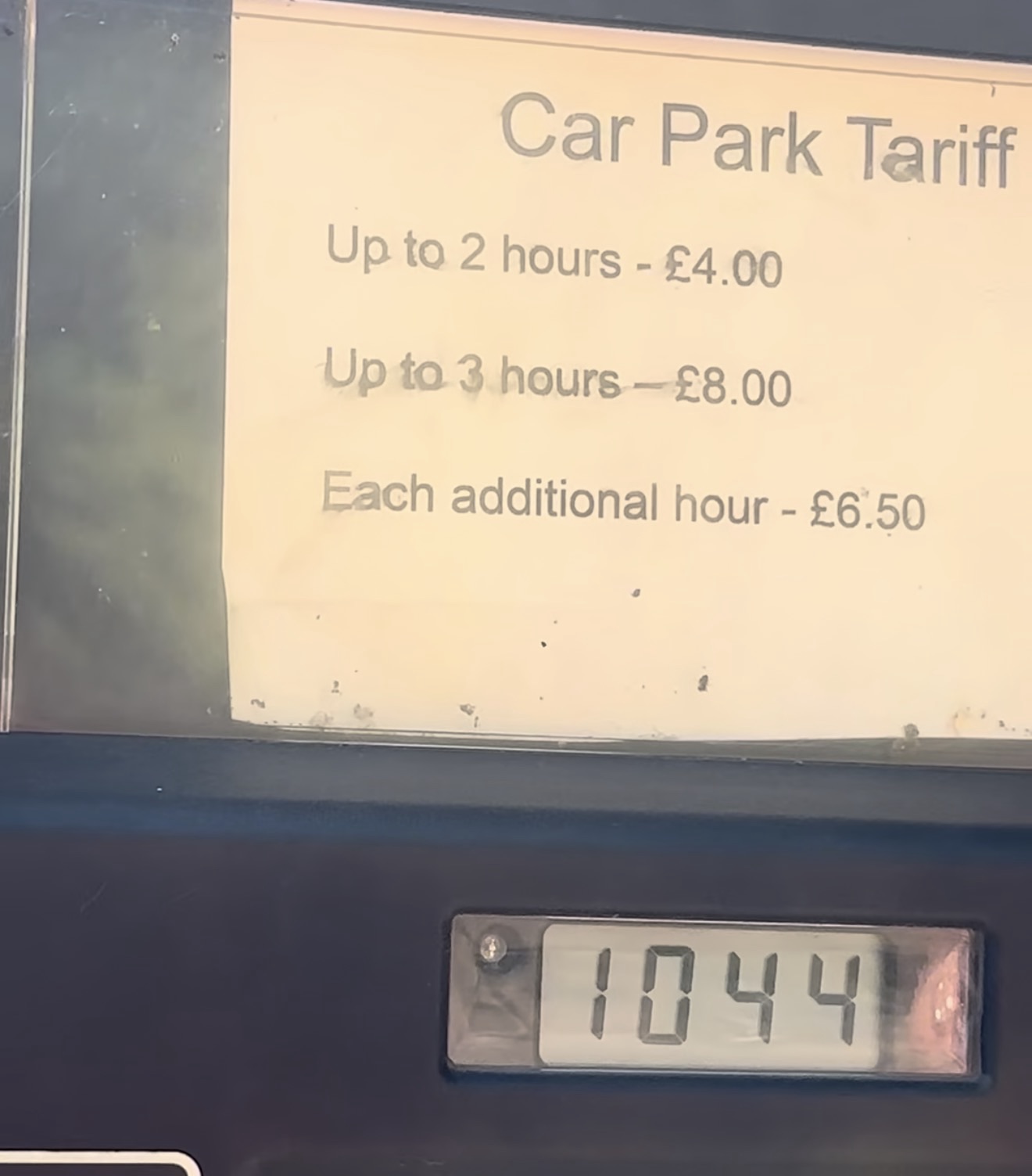 Car park tariff sign at Marble Hill Park showing hourly parking charges