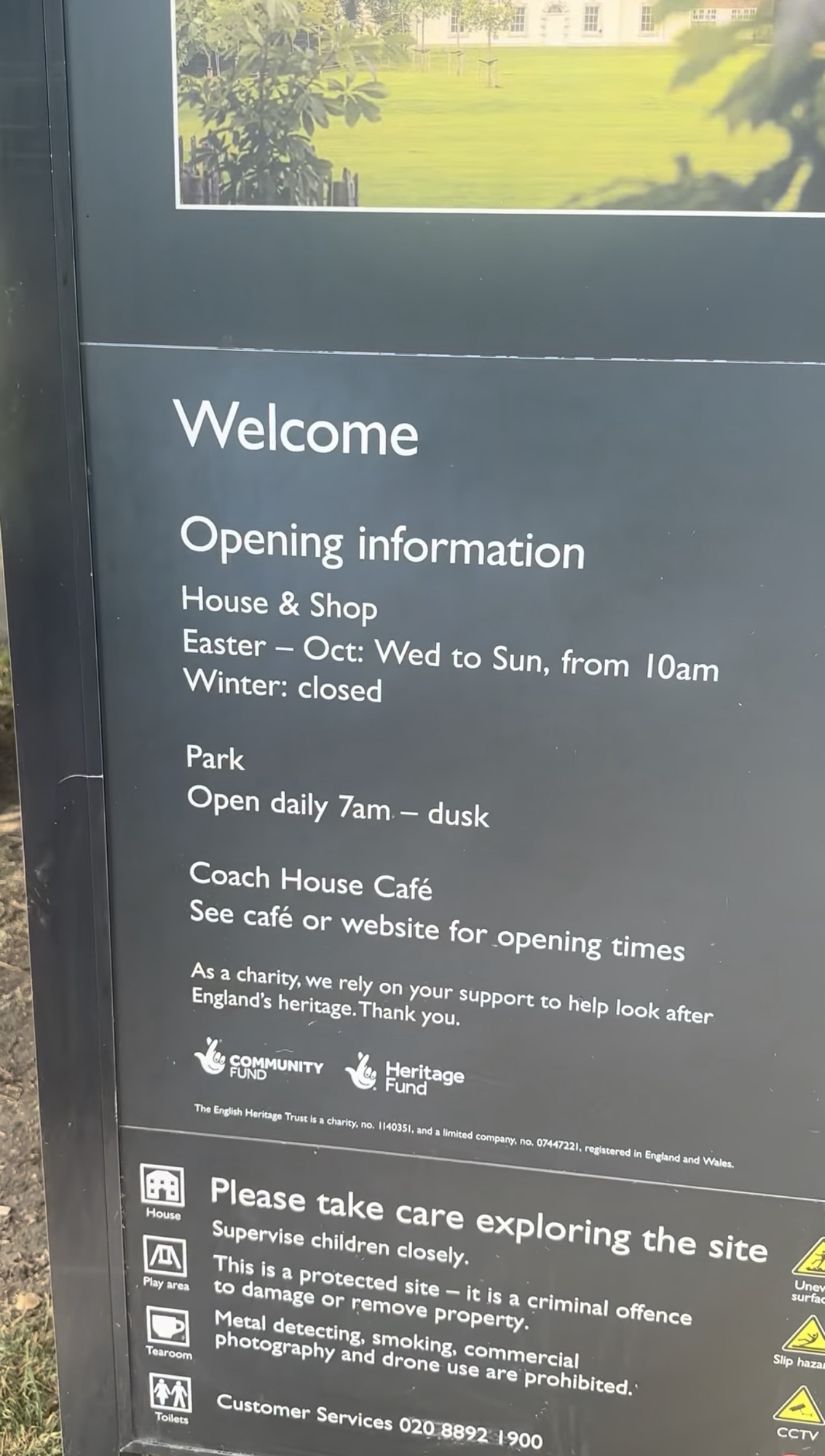 Close-up of the Marble Hill welcome sign listing opening information and site rules