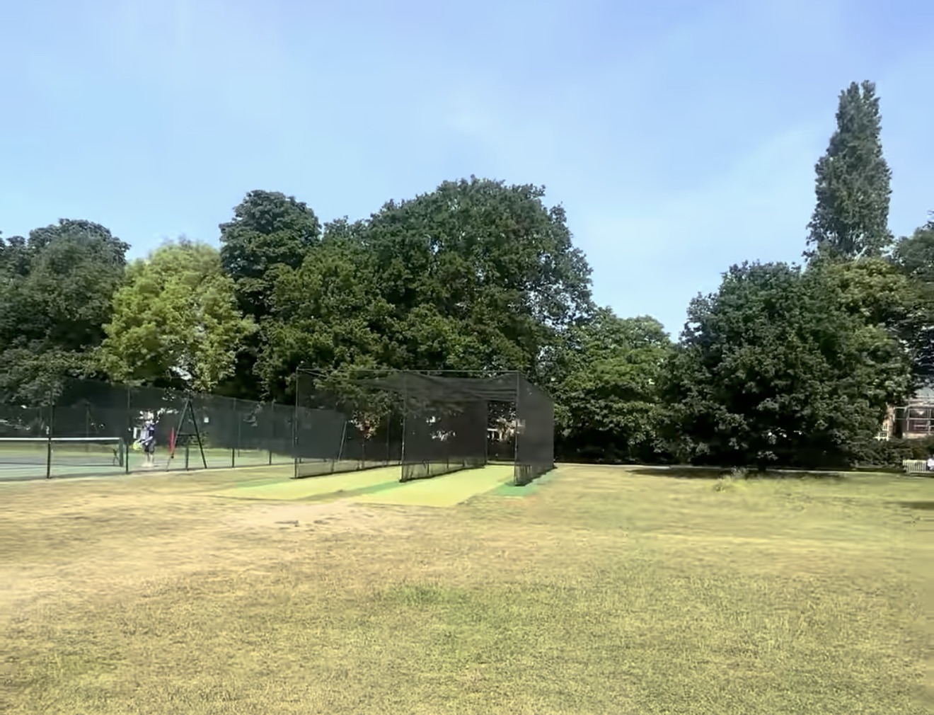 Cricket practice nets next to the tennis courts in Marble Hill Park