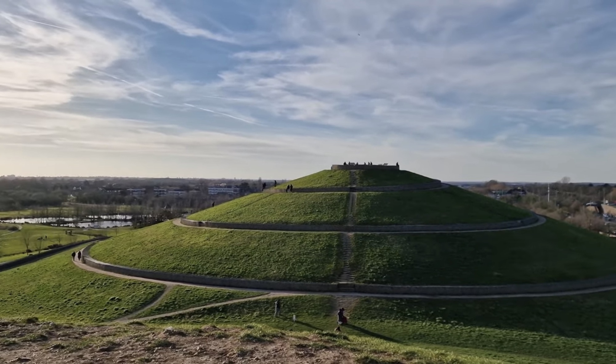 The tallest grassy cone-shaped mound with its spiral path at Northala Fields in Northolt