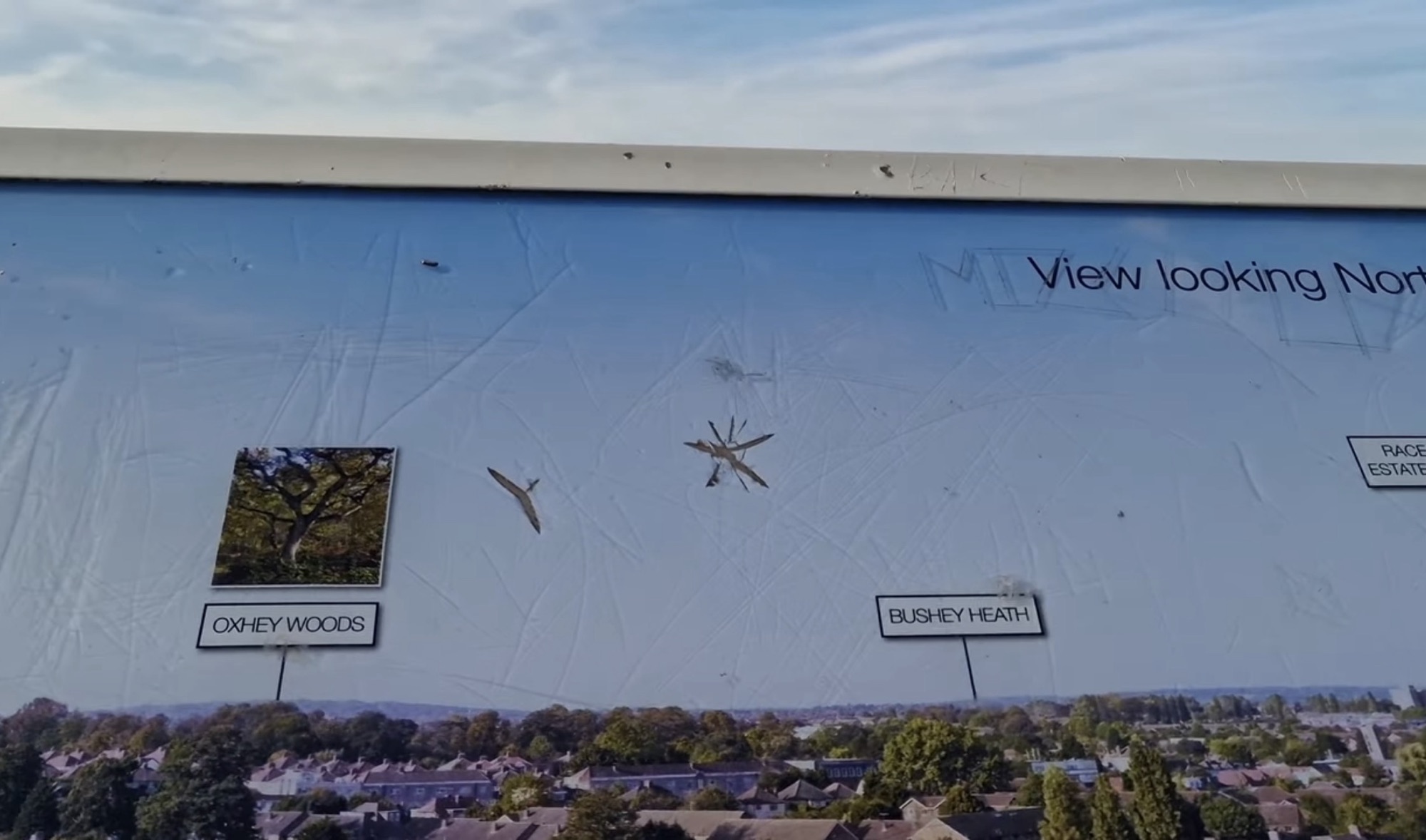 Viewpoint panel at Northala Fields labelling Oxhey Woods and Bushey Heath on the northern horizon