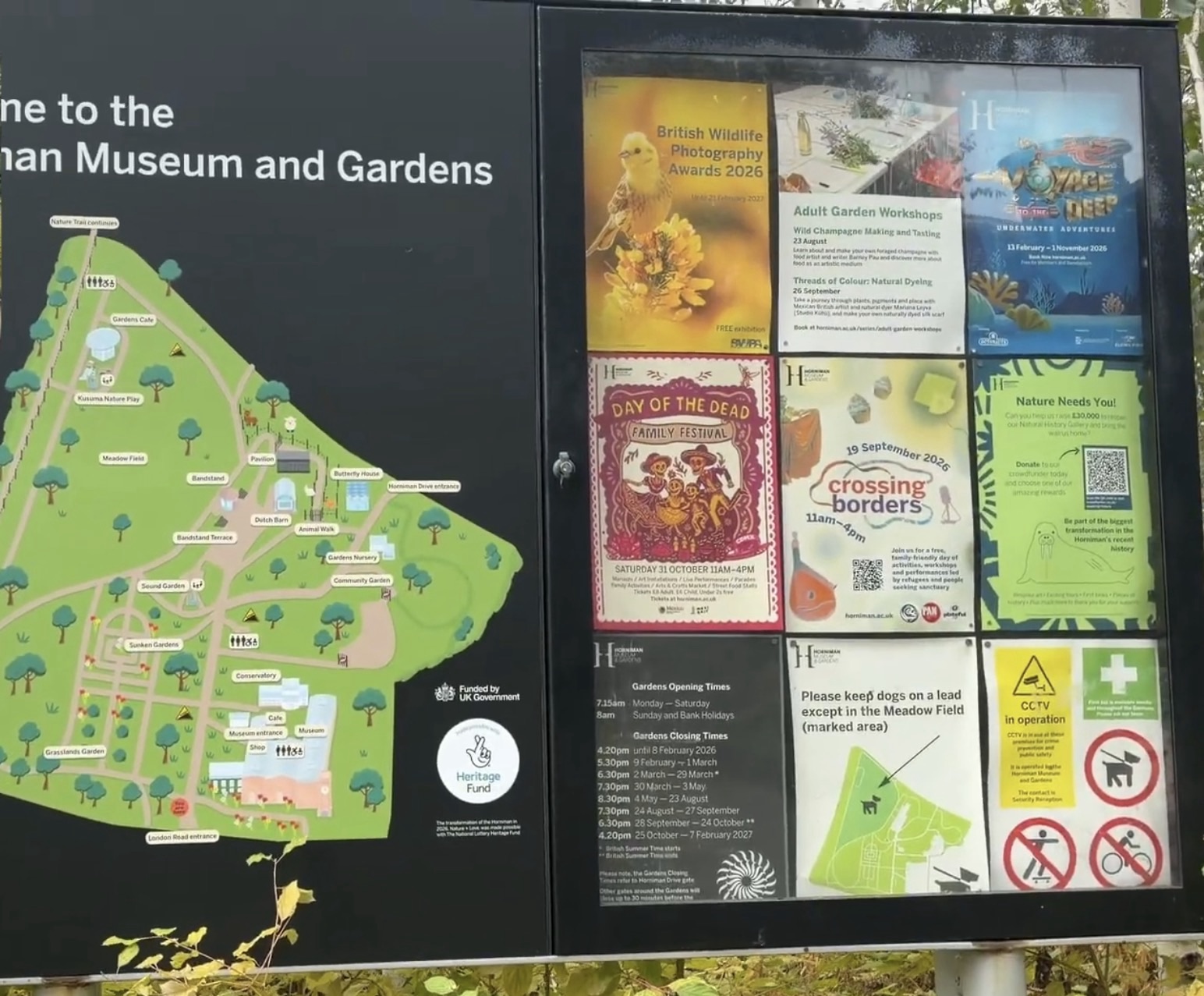 Map board at the Horniman Gardens showing the layout of the gardens with seasonal opening times and event posters